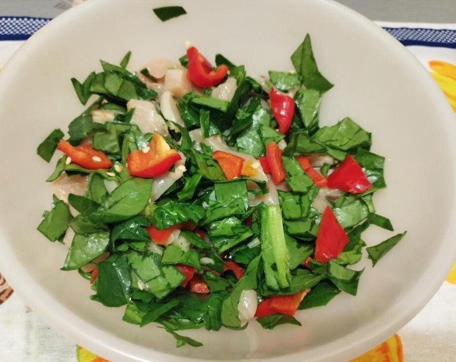 Mixture of paprika, spinach and chicken breasts chopped and put together
